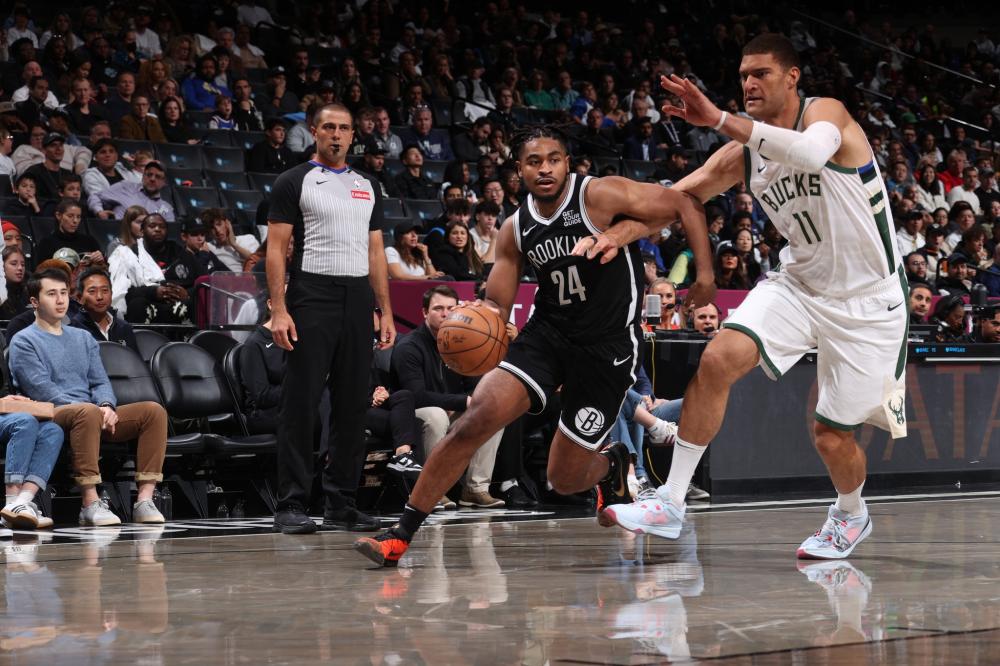 B费晒麦克托米奈球衣：征服那不勒斯之心的名字